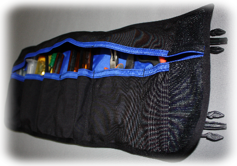 Tool pouch rolls up and fits onto moducarry carrier clips